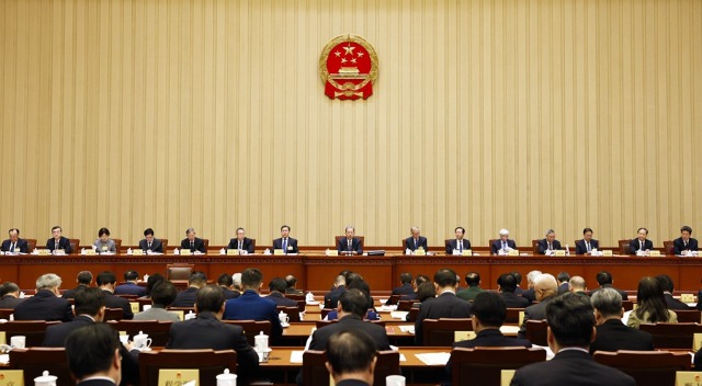 十四届全国人大常委会第十四次会议在京举行 审议全国人大常委会工作报告稿等 为召开十四届全国人大三次会议作准备 赵乐际主持
